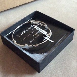 Never worn Alex and Ani cross bracelet