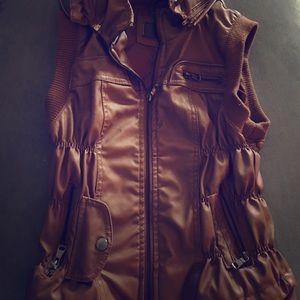 Leather hooded vest.