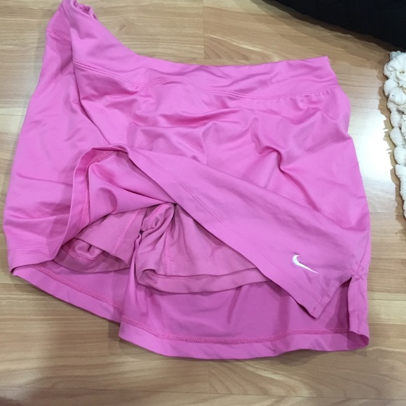 Nike pink tennis skirt w shorts built in...