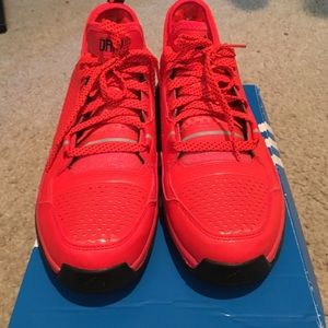 Orange adidas basketball shoes