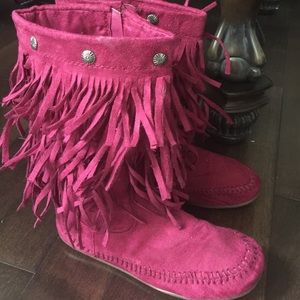 Girls pink moccasin boots.