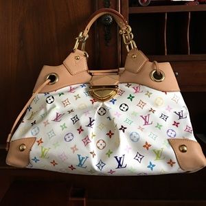Authentic Louis Vuitton Ursula Monogram Handbag