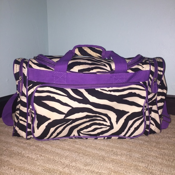 Zebra over night bag with purple rimming
