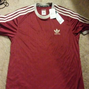 NWT burgundy adidas skateboarding shirt.