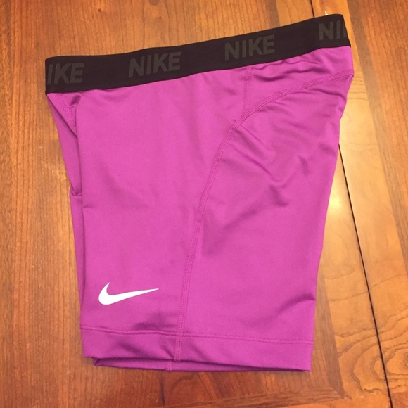 Purple size M Nike pros.
