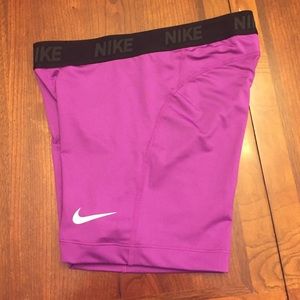 Purple size M Nike pros.