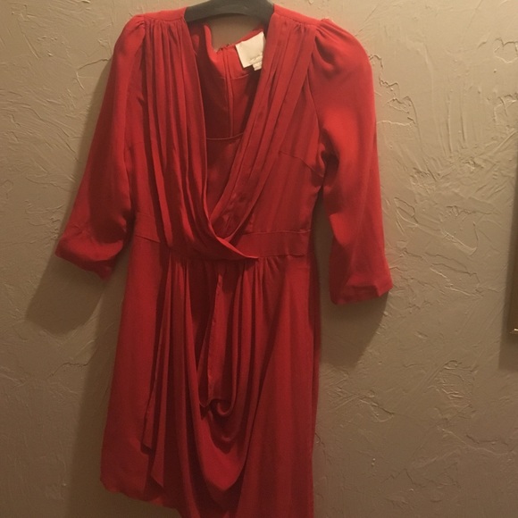 Aryn K mini dress with drappy front panels