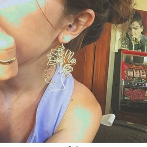 Curly haired man earrings