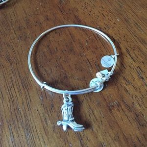 Silver Alex and Ani cowboy boot bracelet.