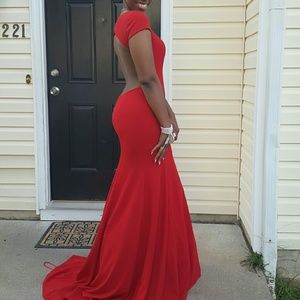 Red Backless dress with train.