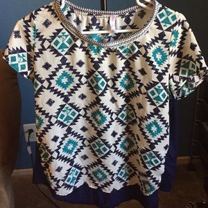 Patterned blouse.