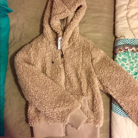 Size Medium, fuzzy jacket/sweater, new