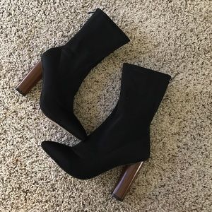 Blank mid-calf booties.