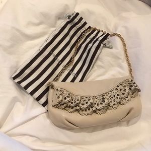 Henri Bendel Cream Clutch with Gold Chain