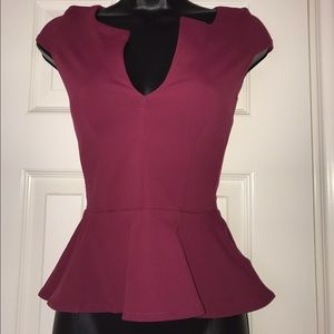 High low magenta Bebe peplum top
