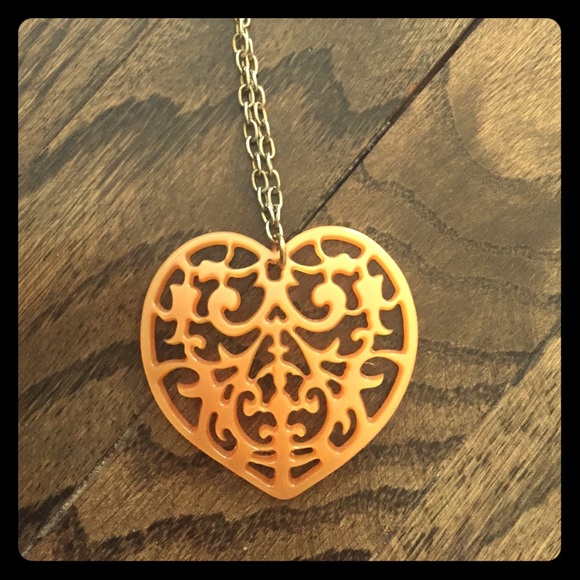 Awesome long necklace with detailed heart charm