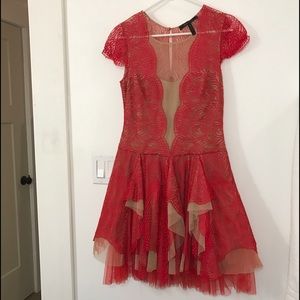 Beautiful lace red dress, wore once! Almost new.