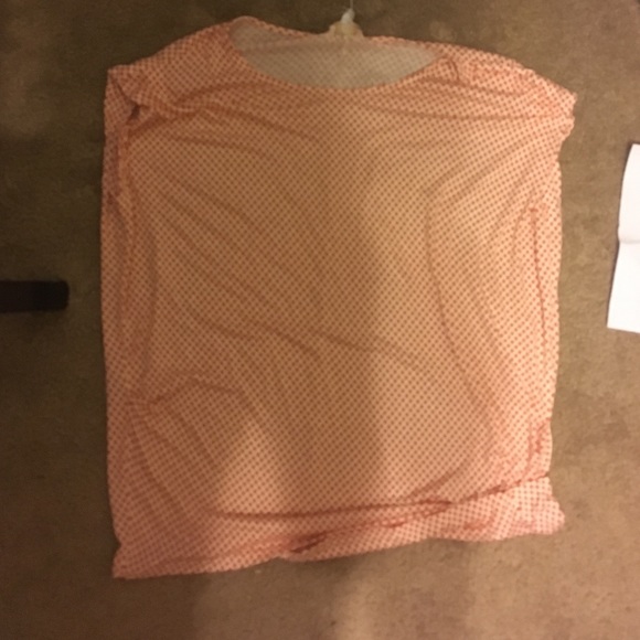 Orange and white pooka dotted shirt