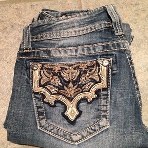 Size 26, boot cut "miss me" jeans
