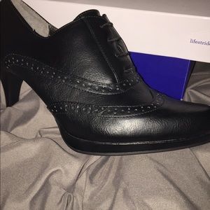 Black wingtip bootie