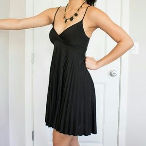 Romantic homecoming pleated little black dress