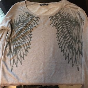 Winged long-sleeve top