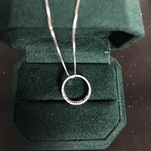 Circle diamond necklace.