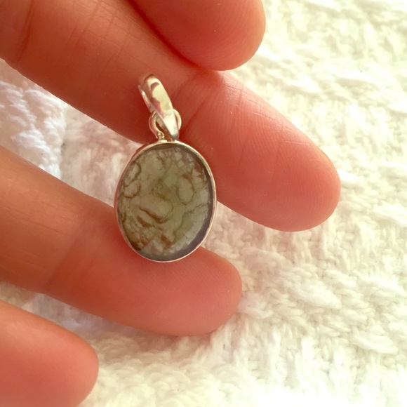 Tiny Faceted Moldavite pendant in solid sterling