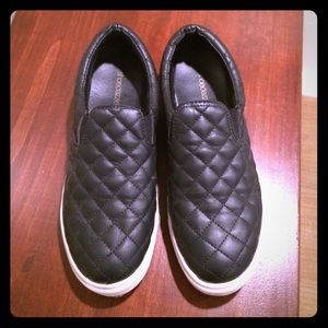 Black faux leather slip-on sneakers