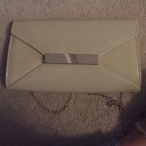 Nude clutch with gold accents