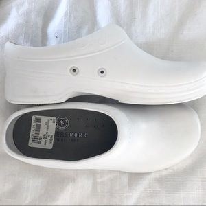 Slip resistant, brand-new white crocs. Size 8