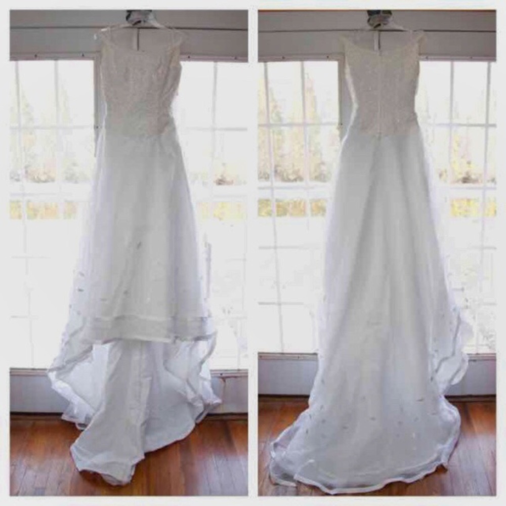Reserved for @ellen70 Michaelangelo size 10 gown