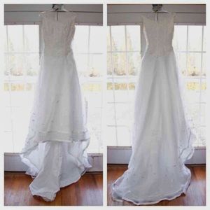 Reserved for @ellen70 Michaelangelo size 10 gown