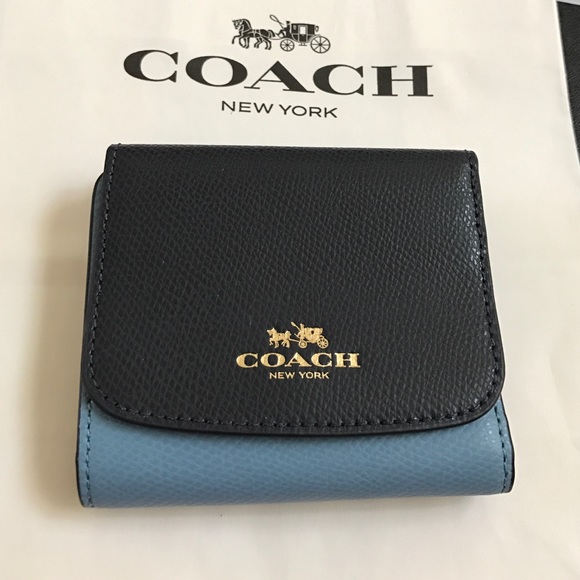 Coach leather hold wallet.