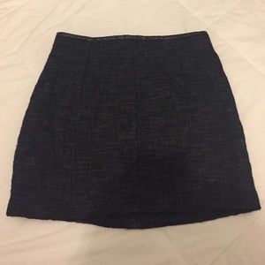Blue and black tweed skirt with leather waist trim