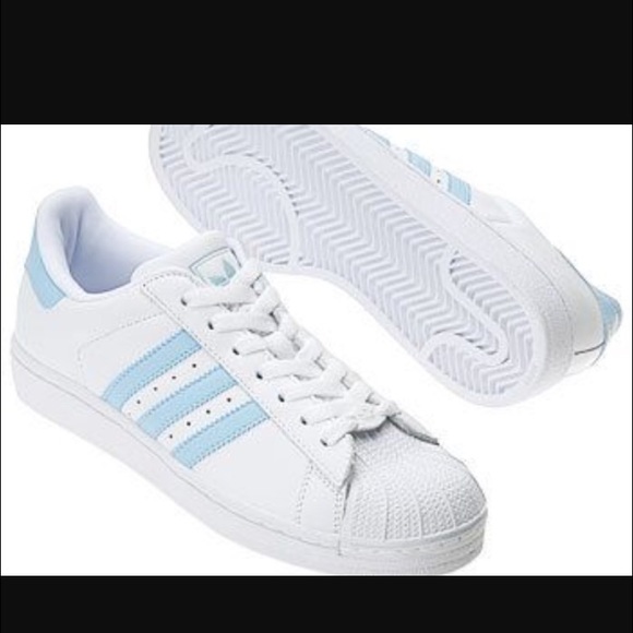 white and baby blue adidas