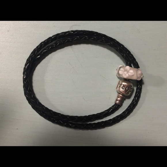 Pandora braided leather bracelet with charm.