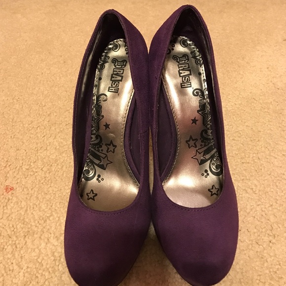 Purple high heels. Worn once.
