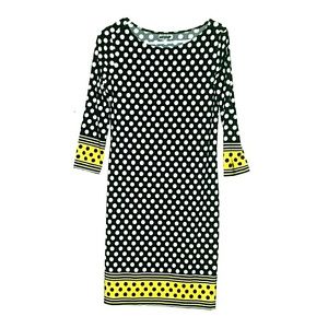 Black and white polkadot dress with yellow accents