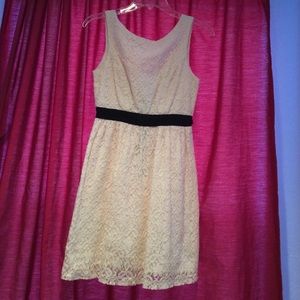 White dress with black sash