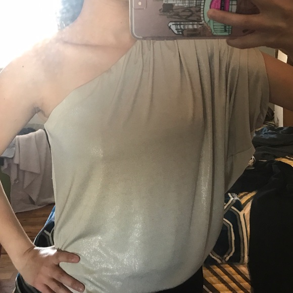 One shoulder sleeve formal top.