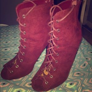 Maroon colored open-toed high heels