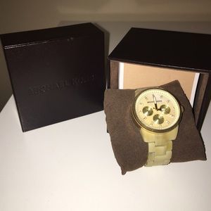 Michael Kors Beige and gold plastic watch
