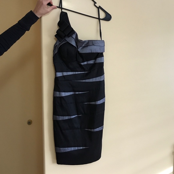 Black and silver dress. One shoulder.