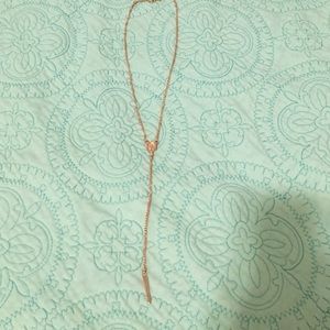 Kendra Scott necklace.