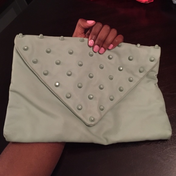 Stylish teal clutch with strap