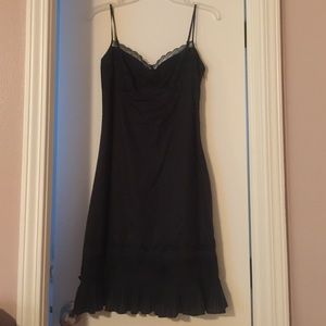 Black spaghetti strapped bcbgmaxazria dress.
