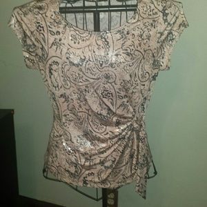 Pink top with black print and shiny foil sparkles