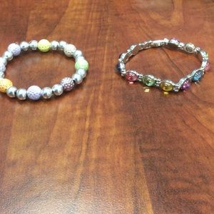 Two silver bracelets with colored stones