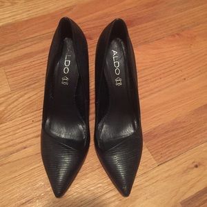 Black Genuine Leather Aldo pumps.